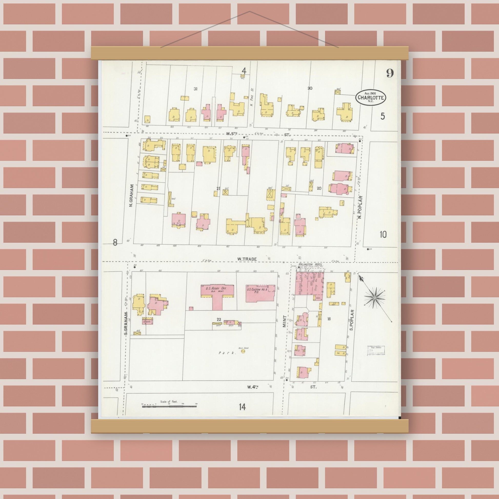 Old map wall art mockup — magnetic wood frame on brick wall — Sanborn Fire Insurance Map from Charlotte, Mecklenburg County, North Carolina (1900), Sheet #0009