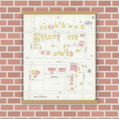 Old map wall art mockup — magnetic wood frame on brick wall — Sanborn Fire Insurance Map from Charlotte, Mecklenburg County, North Carolina (1900), Sheet #0009