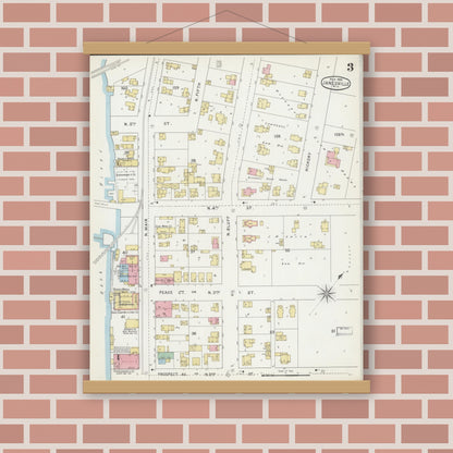 Old map wall art mockup — magnetic wood frame on brick wall — Sanborn Fire Insurance Map from Janesville, Rock County, Wisconsin (1895), Sheet #0003