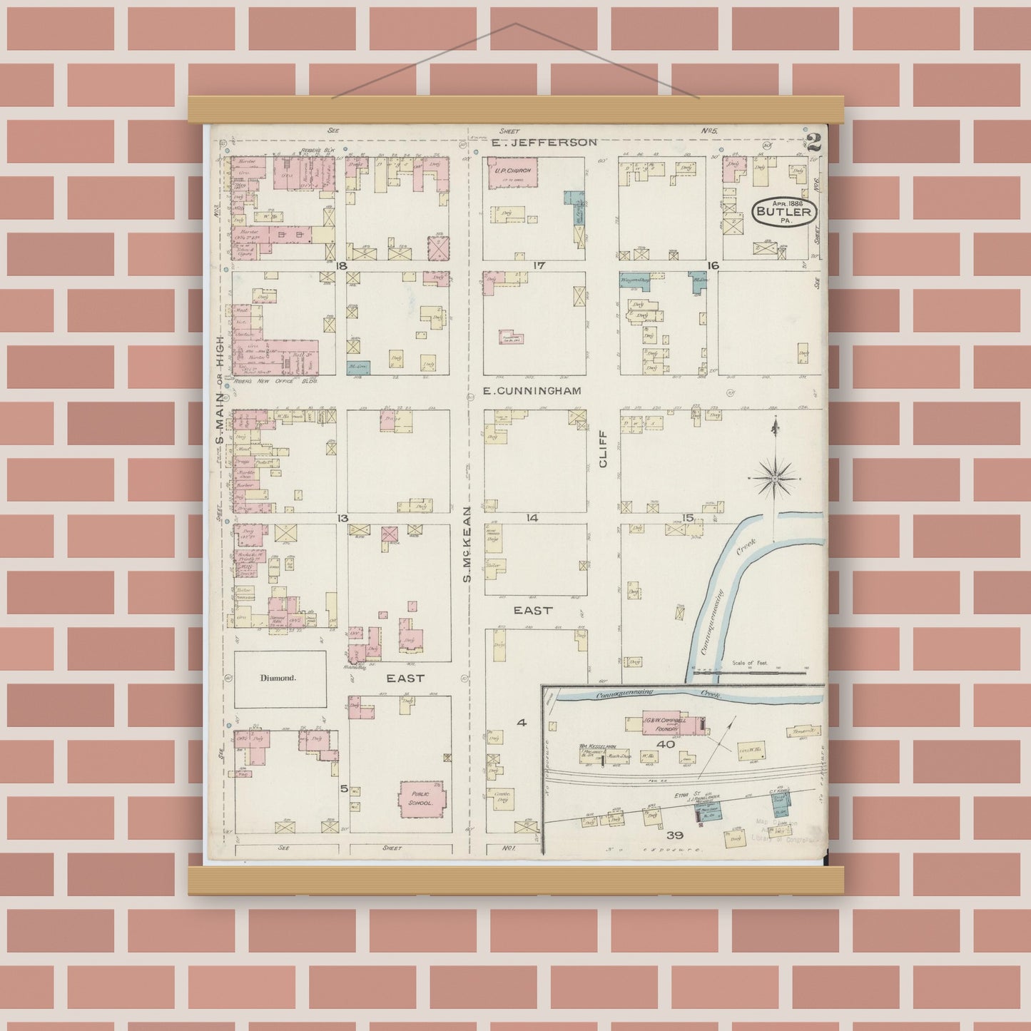 Old map wall art mockup — magnetic wood frame on brick wall — Sanborn Fire Insurance Map from Butler, Butler County, Pennsylvania (1886), Sheet #0002