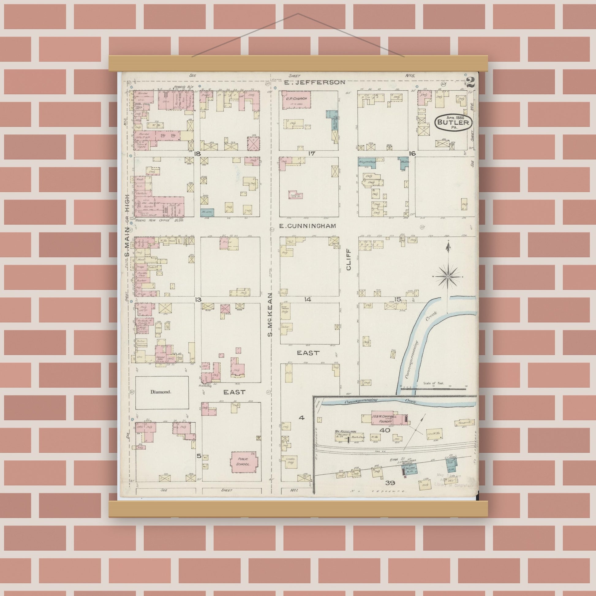 Old map wall art mockup — magnetic wood frame on brick wall — Sanborn Fire Insurance Map from Butler, Butler County, Pennsylvania (1886), Sheet #0002