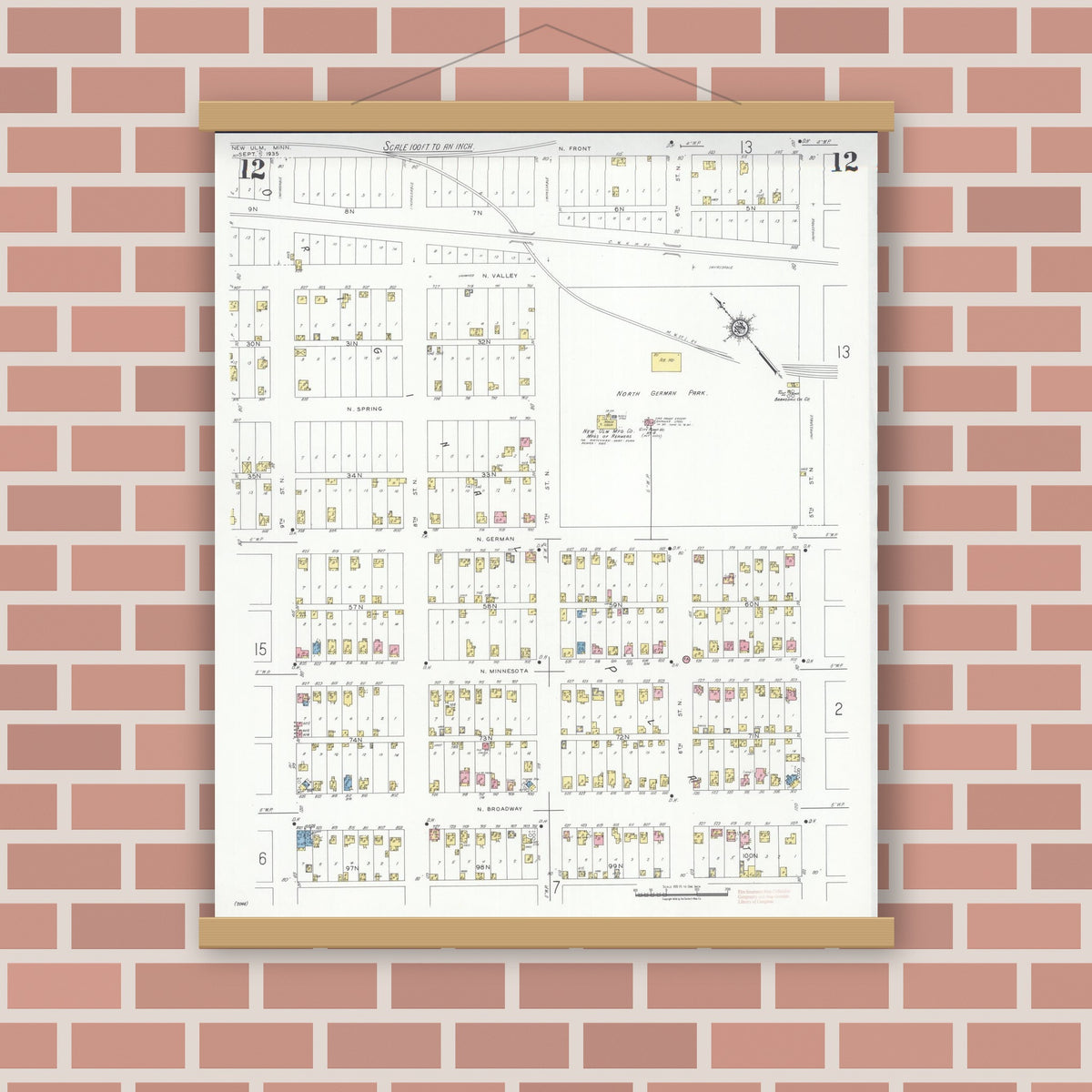 Old map wall art mockup — magnetic wood frame on brick wall — Sanborn Fire Insurance Map from New Ulm, Brown County, Minnesota (1935), Sheet #0012