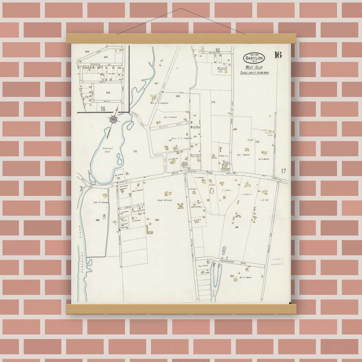 Old map wall art mockup — magnetic wood frame on brick wall — Sanborn Fire Insurance Map from Babylon, Suffolk County, New York (1915), Sheet #0016