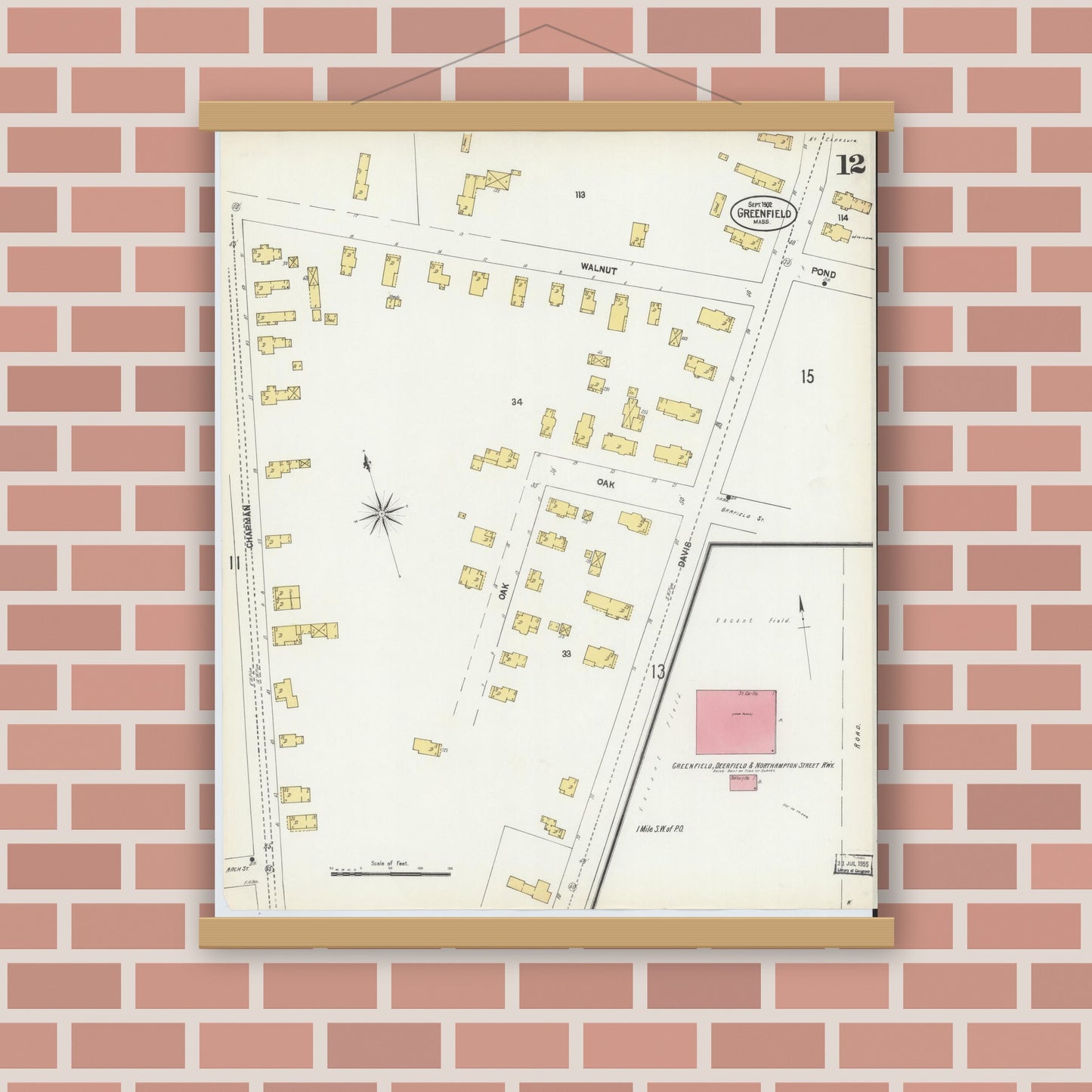 Old map wall art mockup — magnetic wood frame on brick wall — Sanborn Fire Insurance Map from Greenfield, Franklin County, Massachusetts (1902), Sheet #0012