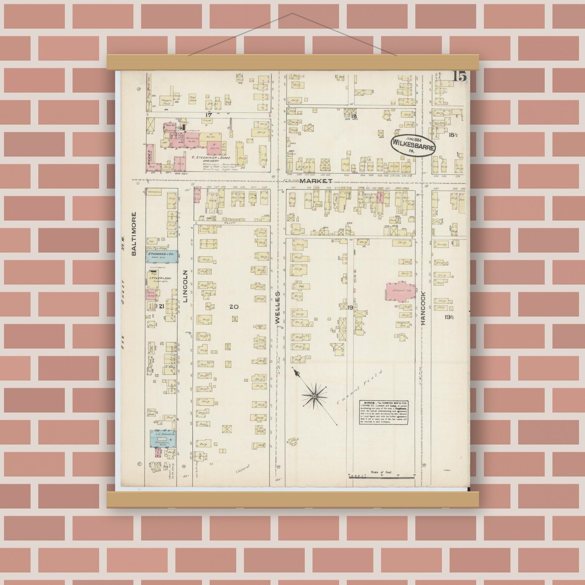 Old map wall art mockup — magnetic wood frame on brick wall — Sanborn Fire Insurance Map from Wilkes Barre, Luzerne County, Pennsylvania (1884), Sheet #0015
