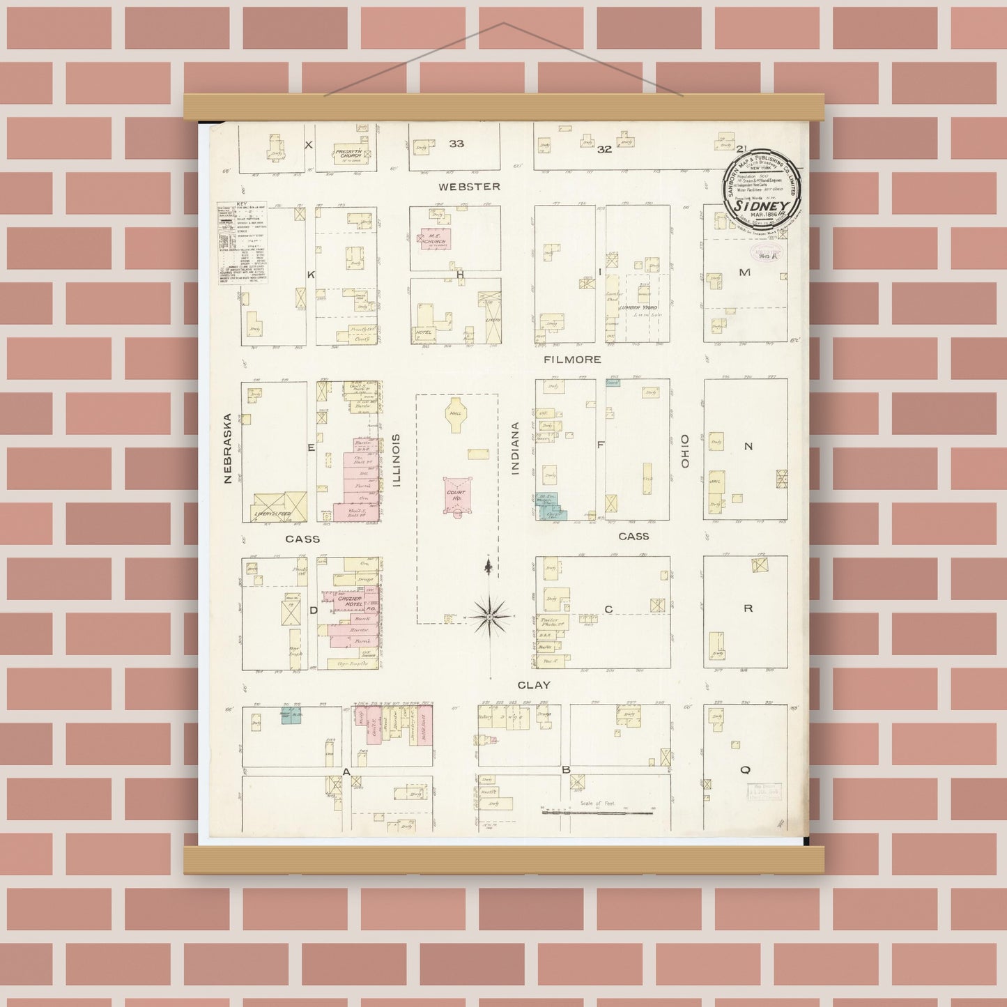 Old map wall art mockup — magnetic wood frame on brick wall — Sanborn Fire Insurance Map from Sidney, Fremont County, Iowa (1886), Sheet #0001