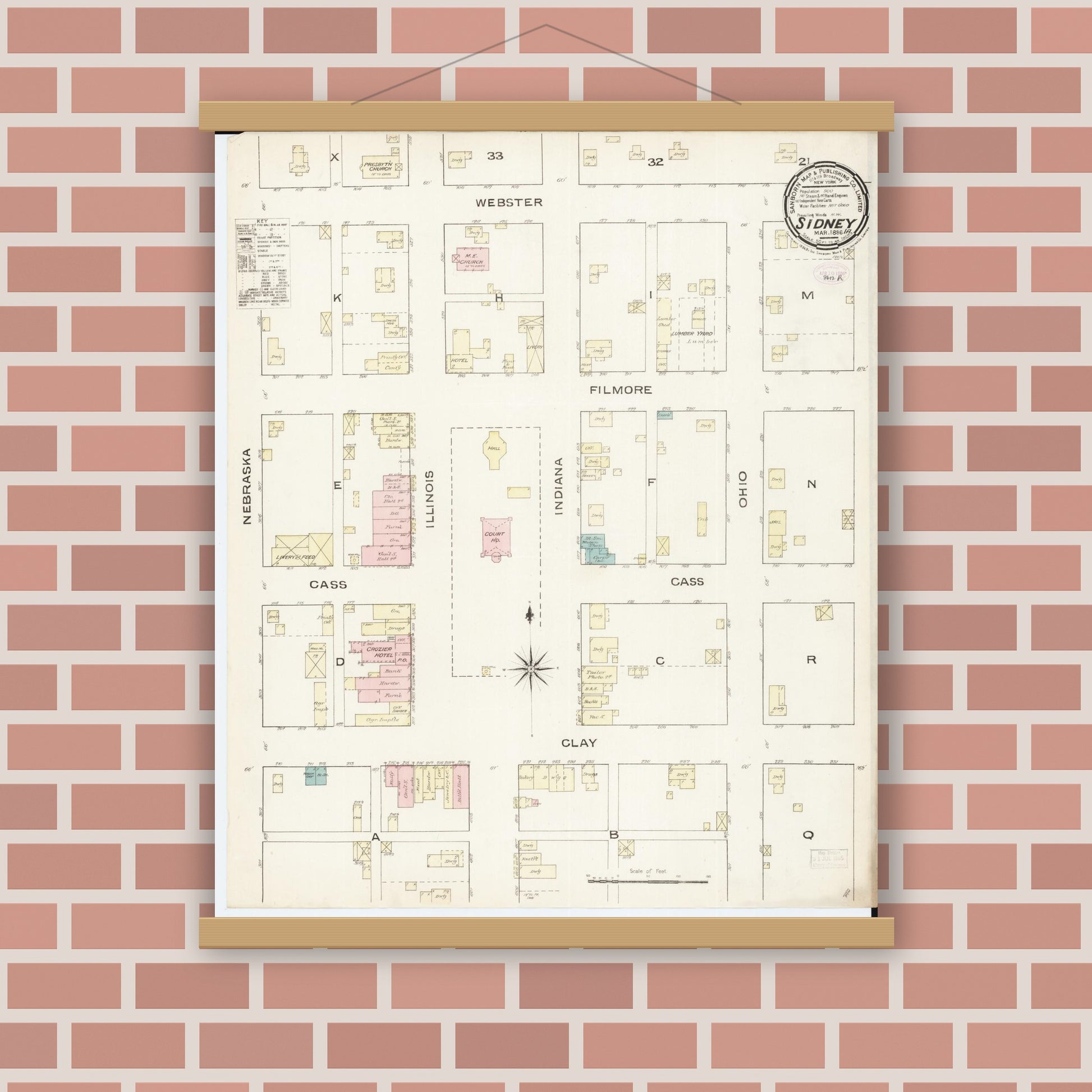 Old map wall art mockup — magnetic wood frame on brick wall — Sanborn Fire Insurance Map from Sidney, Fremont County, Iowa (1886), Sheet #0001