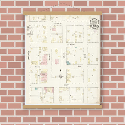 Old map wall art mockup — magnetic wood frame on brick wall — Sanborn Fire Insurance Map from Sidney, Fremont County, Iowa (1886), Sheet #0001