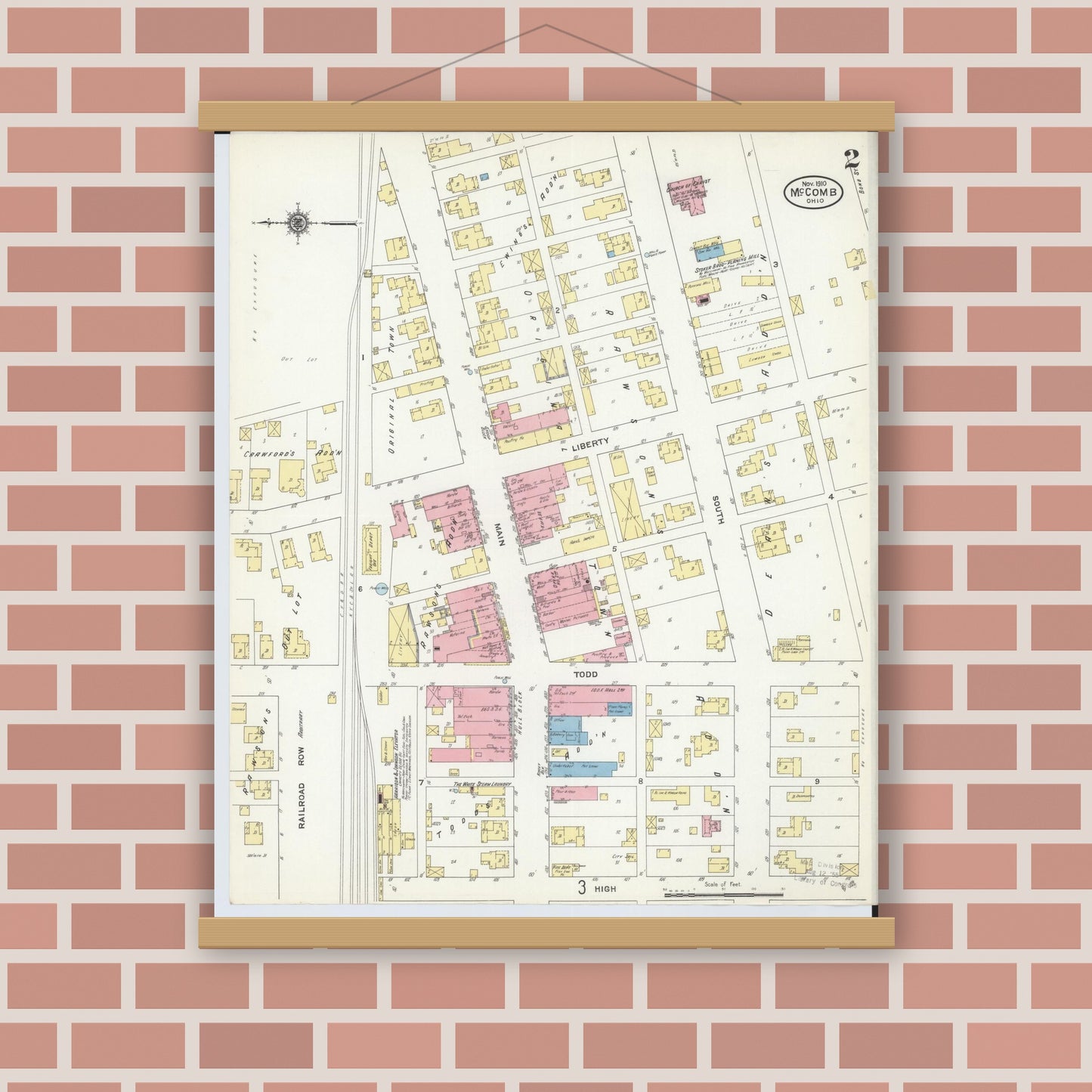 Old map wall art mockup — magnetic wood frame on brick wall — Sanborn Fire Insurance Map from McComb, Hancock County, Ohio (1910), Sheet #0002