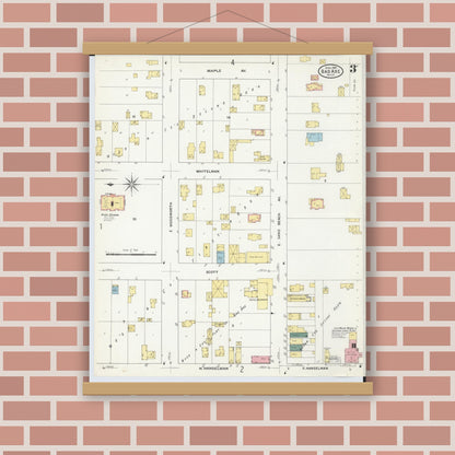 Old map wall art mockup — magnetic wood frame on brick wall — Sanborn Fire Insurance Map from Bad Axe, Huron County, Michigan (1909), Sheet #0003