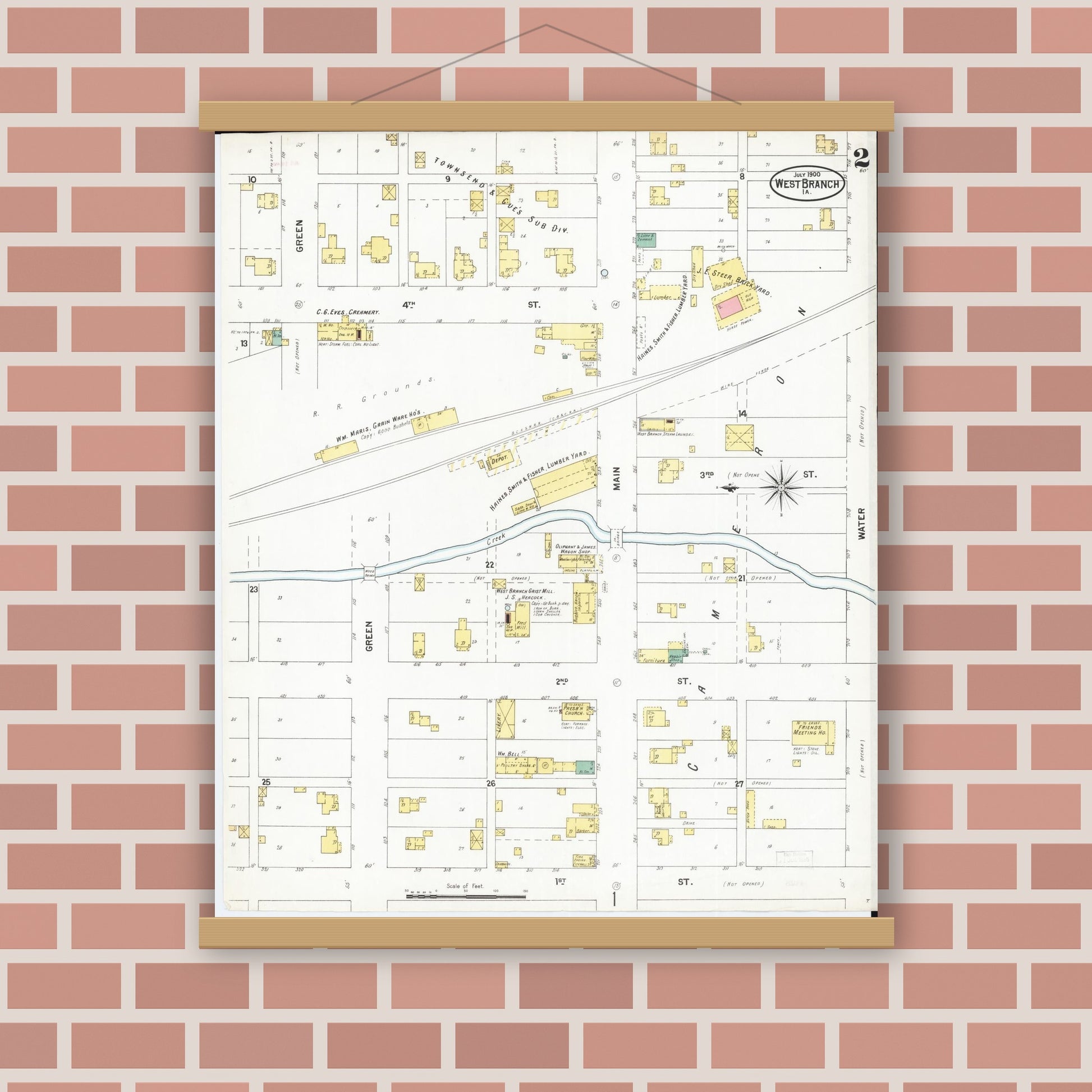 Old map wall art mockup — magnetic wood frame on brick wall — Sanborn Fire Insurance Map from West Branch, Cedar County, Iowa (1900), Sheet #0002