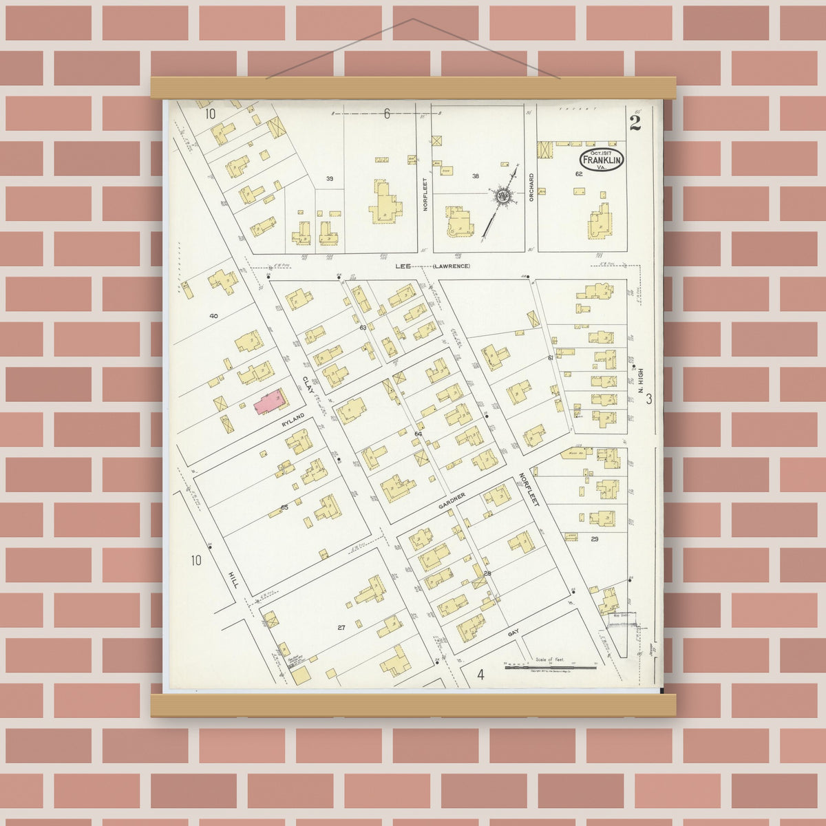 Old map wall art mockup — magnetic wood frame on brick wall — Sanborn Fire Insurance Map from Franklin, Independent Cities, Virginia (1917), Sheet #0002