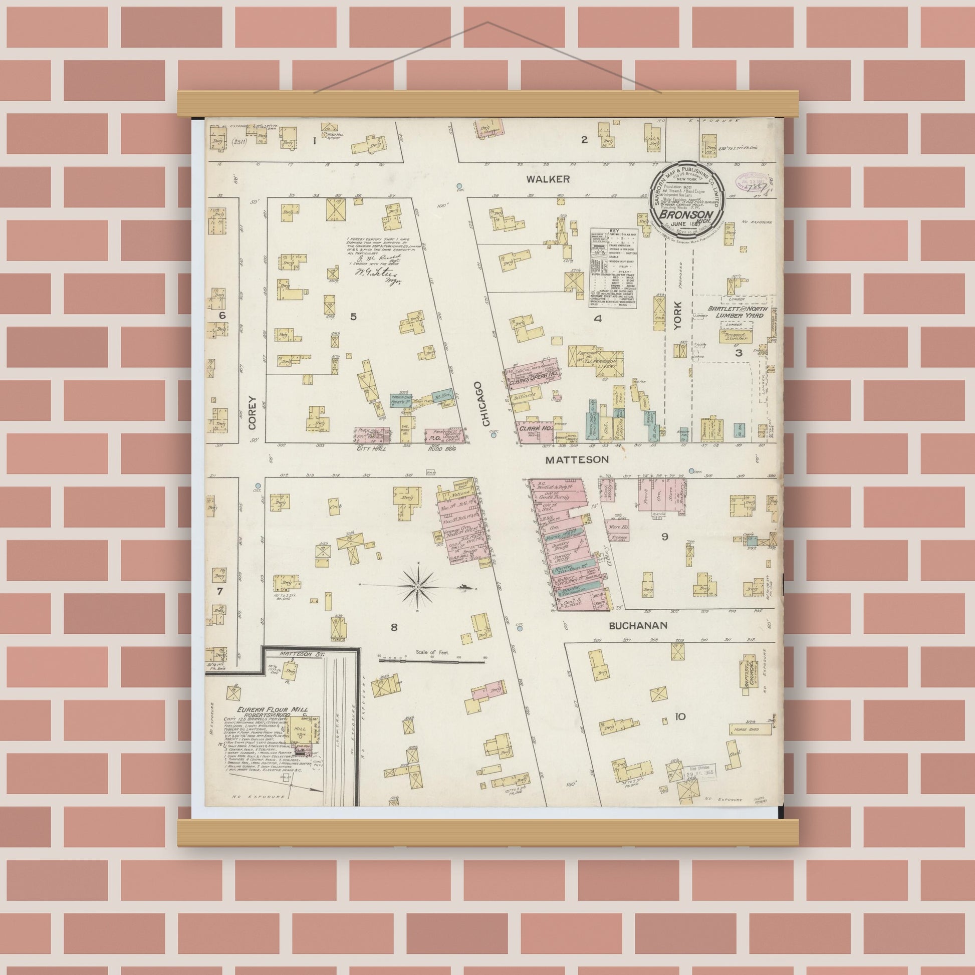 Old map wall art mockup — magnetic wood frame on brick wall — Sanborn Fire Insurance Map from Bronson, Branch County, Michigan (1887), Sheet #0001