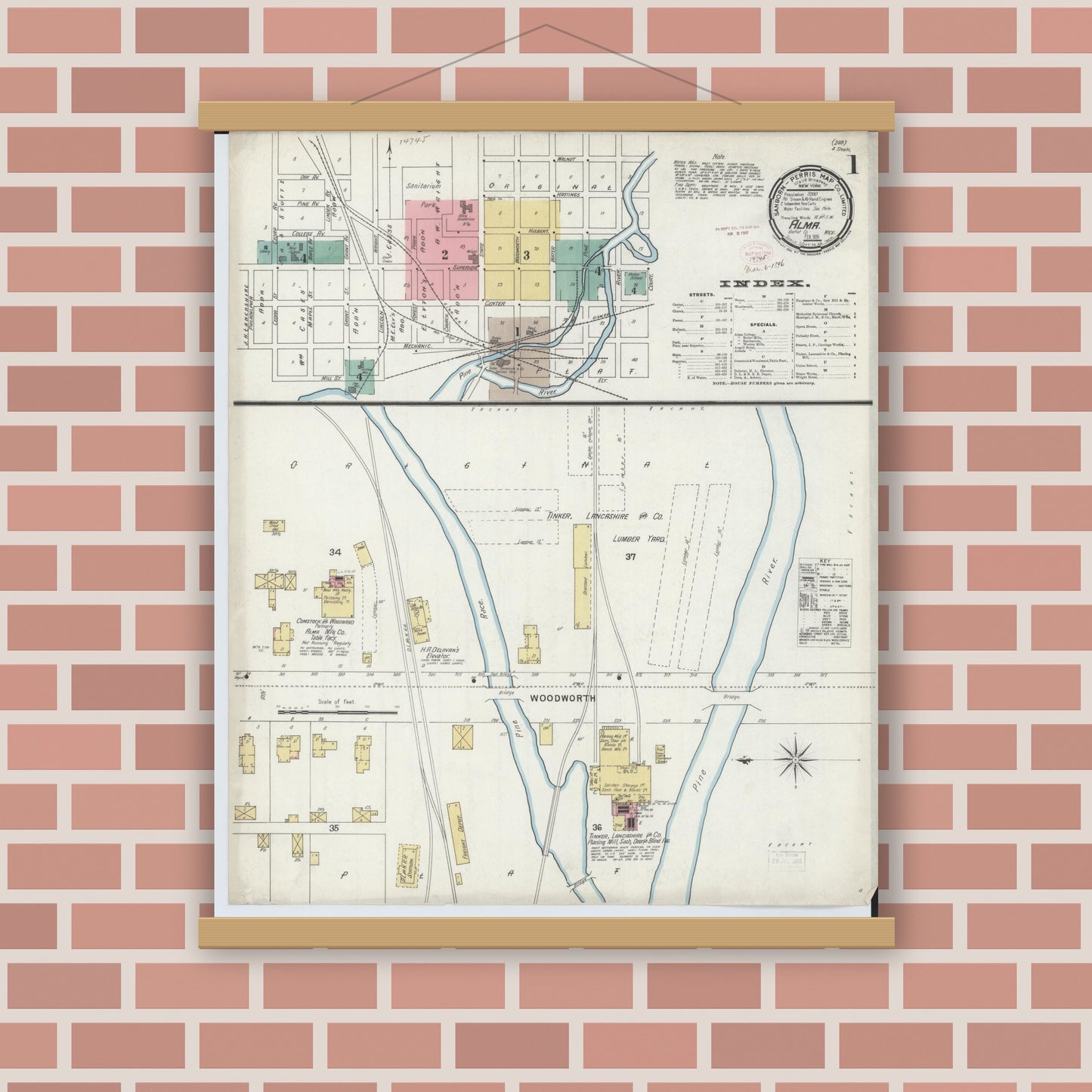 Old map wall art mockup — magnetic wood frame on brick wall — Sanborn Fire Insurance Map from Alma, Gratiot County, Michigan (1896), Sheet #0001
