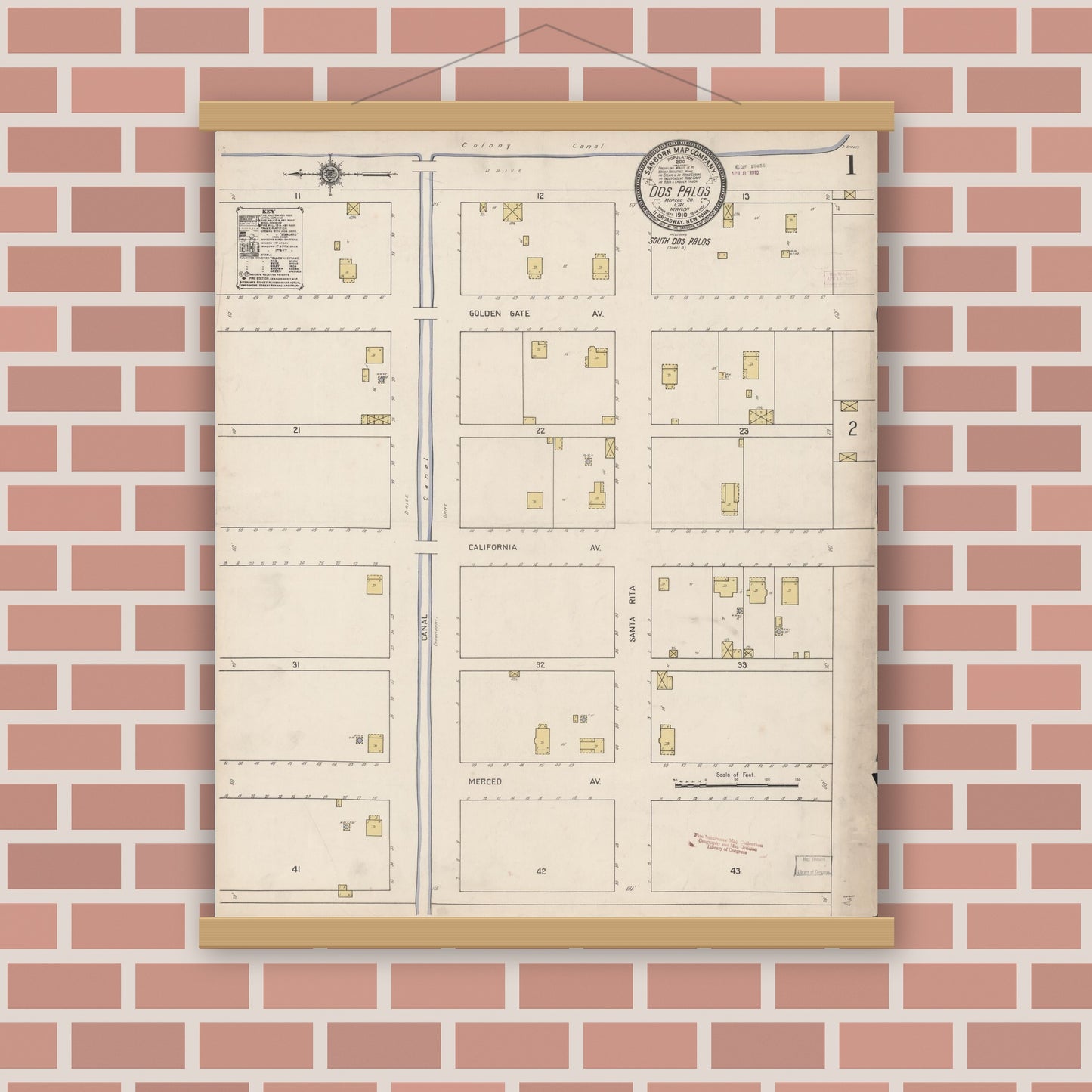 Old map wall art mockup — magnetic wood frame on brick wall — Sanborn Fire Insurance Map from Dos Palos, Merced County, California (1910) - Complete Map Set
