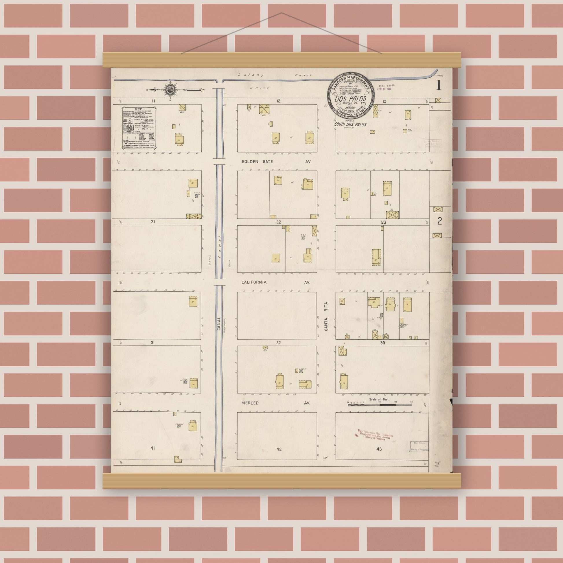 Old map wall art mockup — magnetic wood frame on brick wall — Sanborn Fire Insurance Map from Dos Palos, Merced County, California (1910) - Complete Map Set