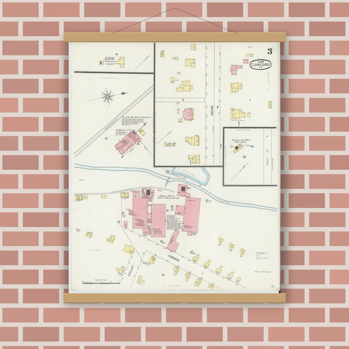 Old map wall art mockup — magnetic wood frame on brick wall — Sanborn Fire Insurance Map from Concord, Cabarrus County, North Carolina (1897), Sheet #0003