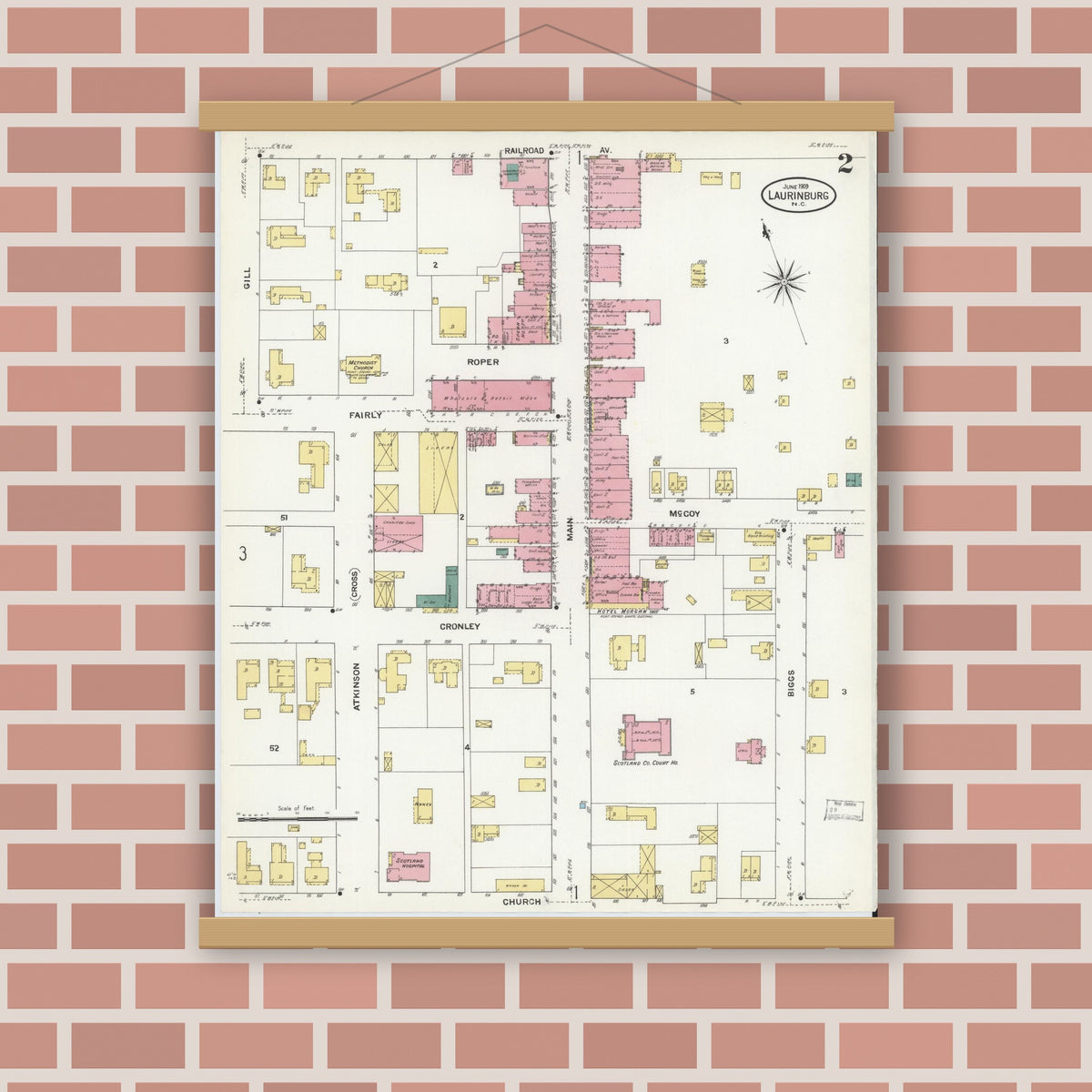 Old map wall art mockup — magnetic wood frame on brick wall — Sanborn Fire Insurance Map from Laurinburg, Scotland County, North Carolina (1909), Sheet #0002
