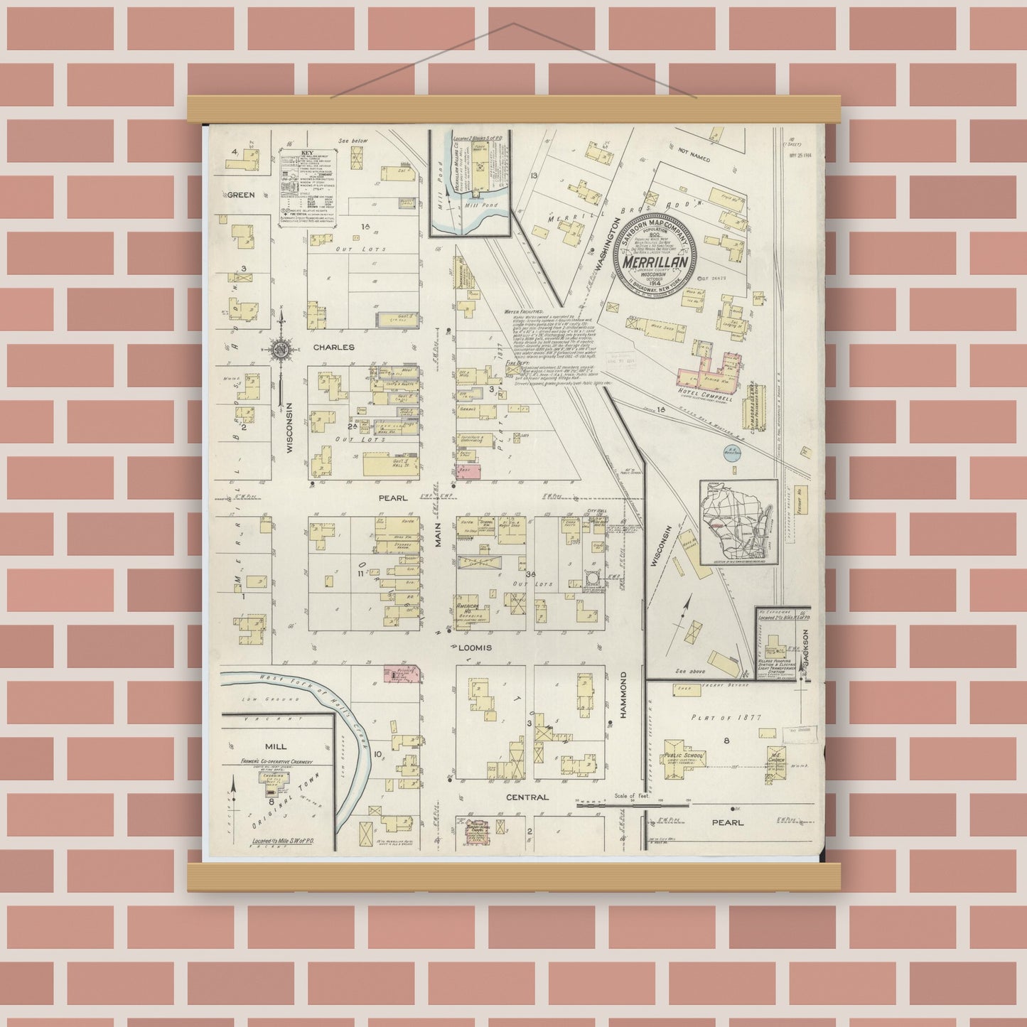 Old map wall art mockup — magnetic wood frame on brick wall — Sanborn Fire Insurance Map from Merrillan, Jackson County, Wisconsin (1914), Sheet #0001