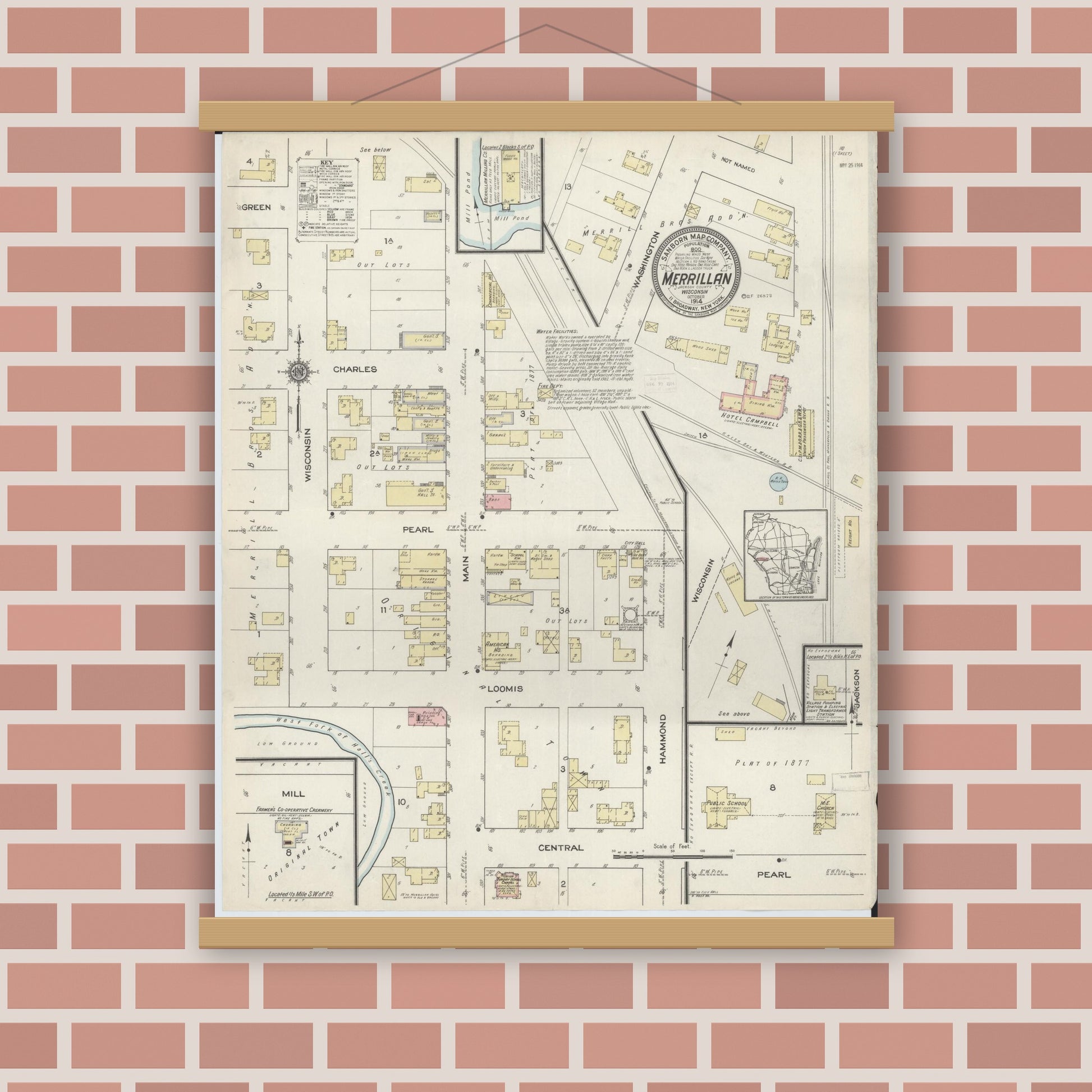 Old map wall art mockup — magnetic wood frame on brick wall — Sanborn Fire Insurance Map from Merrillan, Jackson County, Wisconsin (1914), Sheet #0001