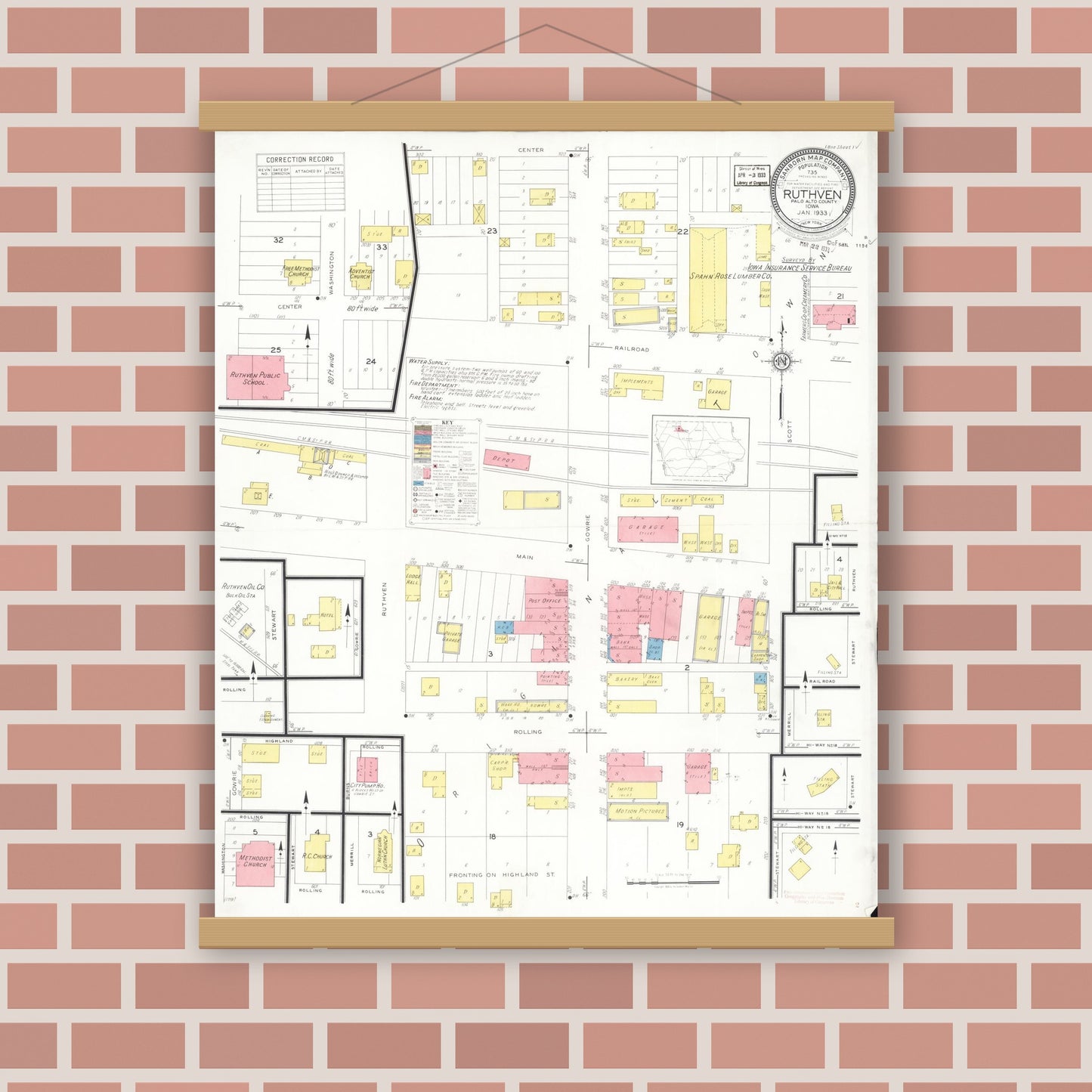 Old map wall art mockup — magnetic wood frame on brick wall — Sanborn Fire Insurance Map from Ruthven, Palo Alto County, Iowa (1933), Sheet #0001