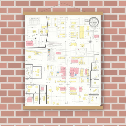 Old map wall art mockup — magnetic wood frame on brick wall — Sanborn Fire Insurance Map from Ruthven, Palo Alto County, Iowa (1933), Sheet #0001