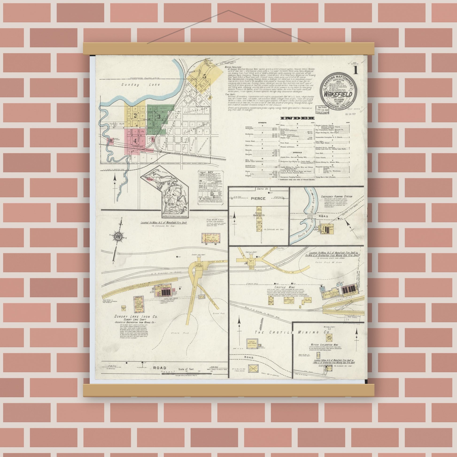 Old map wall art mockup — magnetic wood frame on brick wall — Sanborn Fire Insurance Map from Wakefield, Gogebic County, Michigan (1917), Sheet #0001