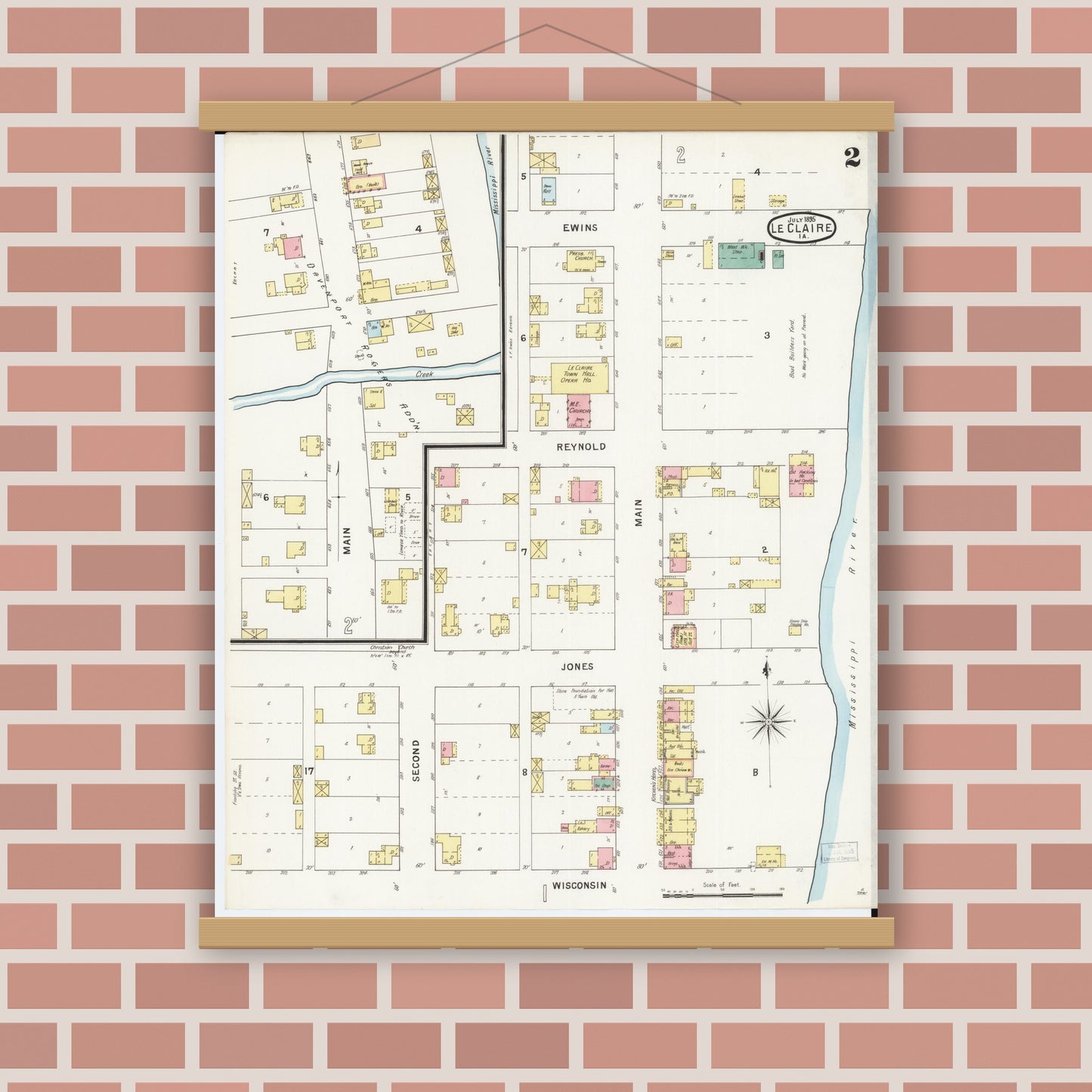 Old map wall art mockup — magnetic wood frame on brick wall — Sanborn Fire Insurance Map from Le Claire, Scott County, Iowa (1895), Sheet #0002