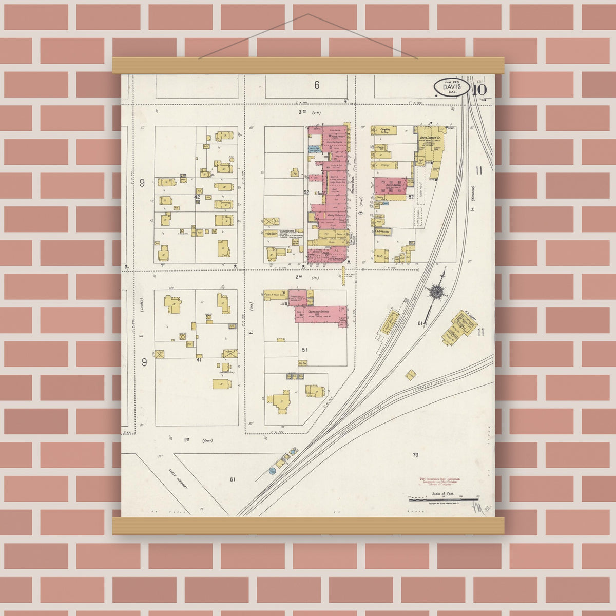 Old map wall art mockup — magnetic wood frame on brick wall — Sanborn Fire Insurance Map from Davis, Yolo County, California (1921), Sheet #0010
