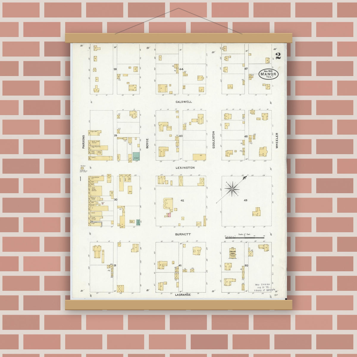 Old map wall art mockup — magnetic wood frame on brick wall — Sanborn Fire Insurance Map from Manor, Travis County, Texas (1905), Sheet #0002