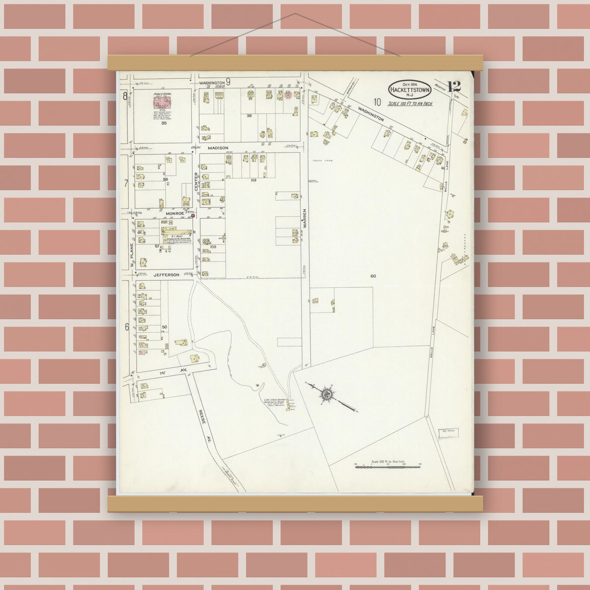 Old map wall art mockup — magnetic wood frame on brick wall — Sanborn Fire Insurance Map from Hackettstown, Warren County, New Jersey (1914), Sheet #0012
