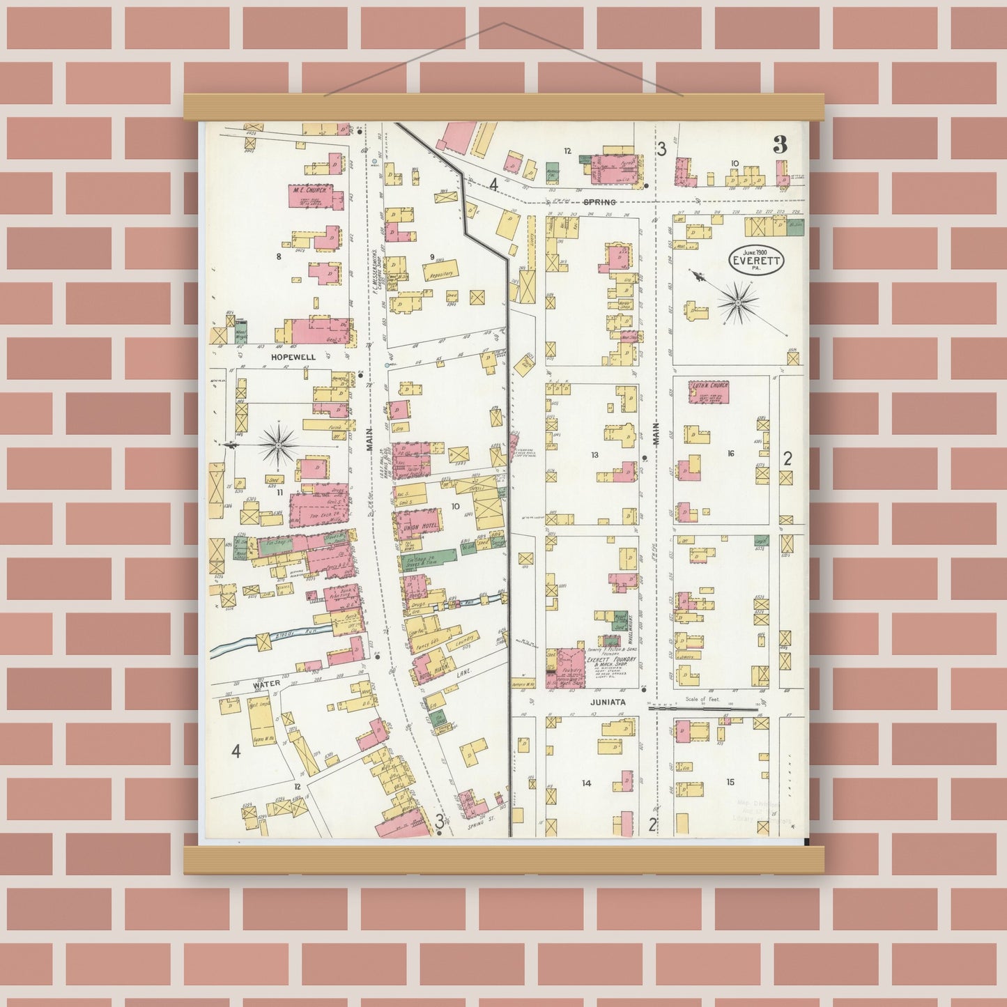 Old map wall art mockup — magnetic wood frame on brick wall — Sanborn Fire Insurance Map from Everett, Bedford County, Pennsylvania (1900), Sheet #0003