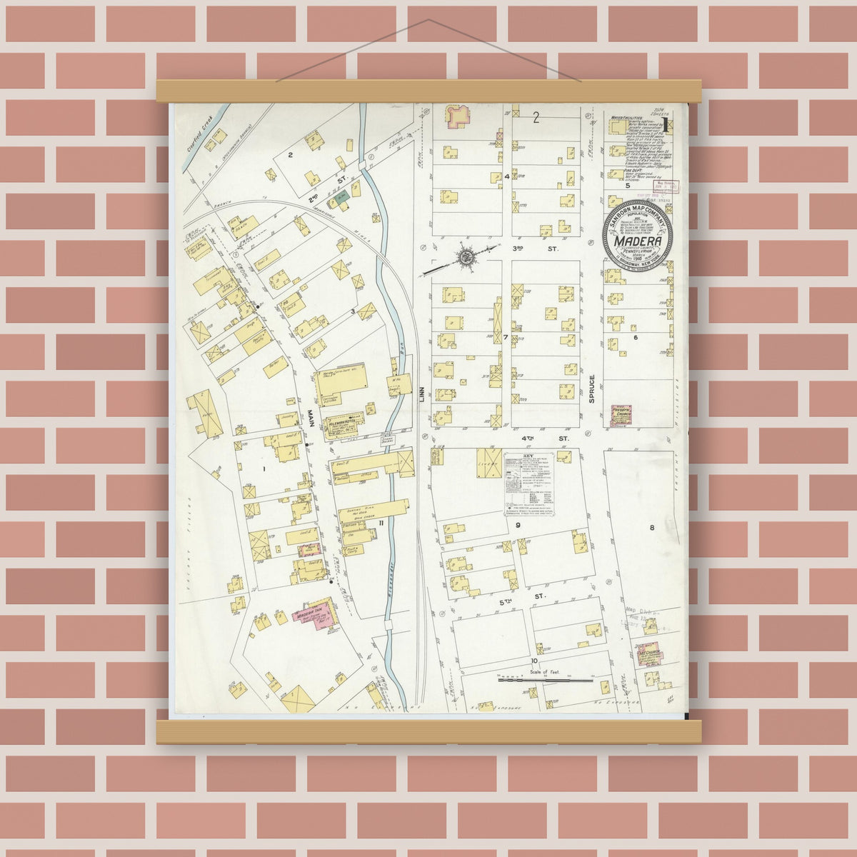 Old map wall art mockup — magnetic wood frame on brick wall — Sanborn Fire Insurance Map from Madera, Clearfield County, Pennsylvania (1910), Sheet #0001