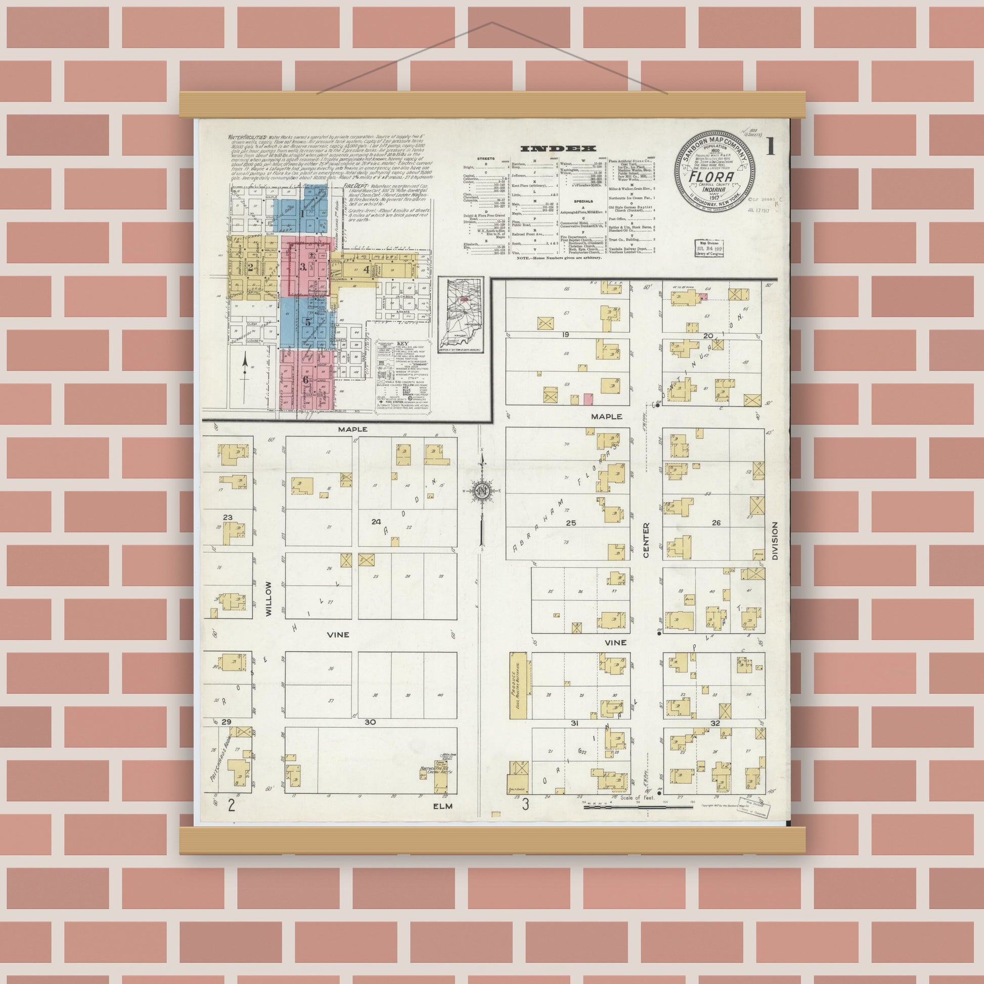 Old map wall art mockup — magnetic wood frame on brick wall — Sanborn Fire Insurance Map from Flora, Carroll County, Indiana (1917), Sheet #0001