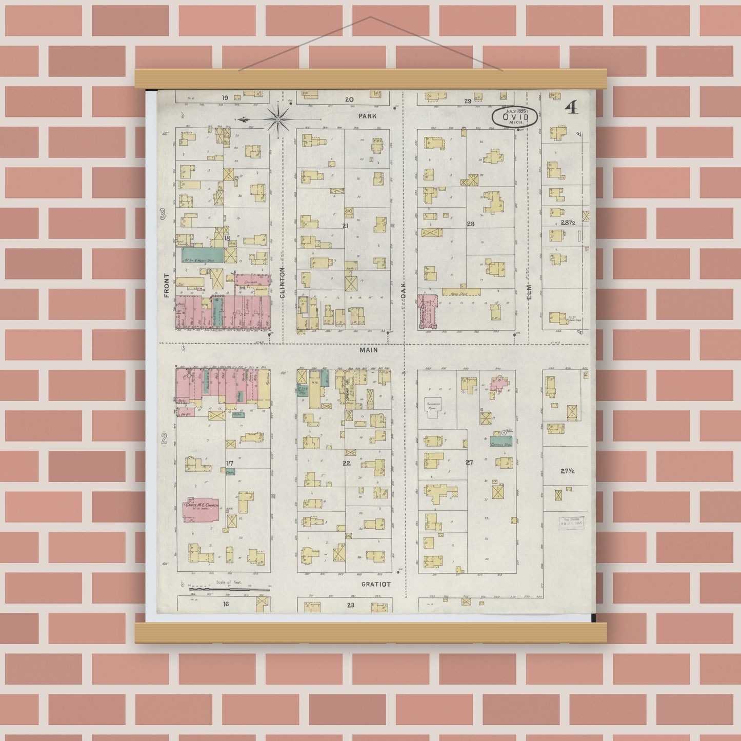 Old map wall art mockup — magnetic wood frame on brick wall — Sanborn Fire Insurance Map from Ovid, Clinton County, Michigan (1895), Sheet #0004