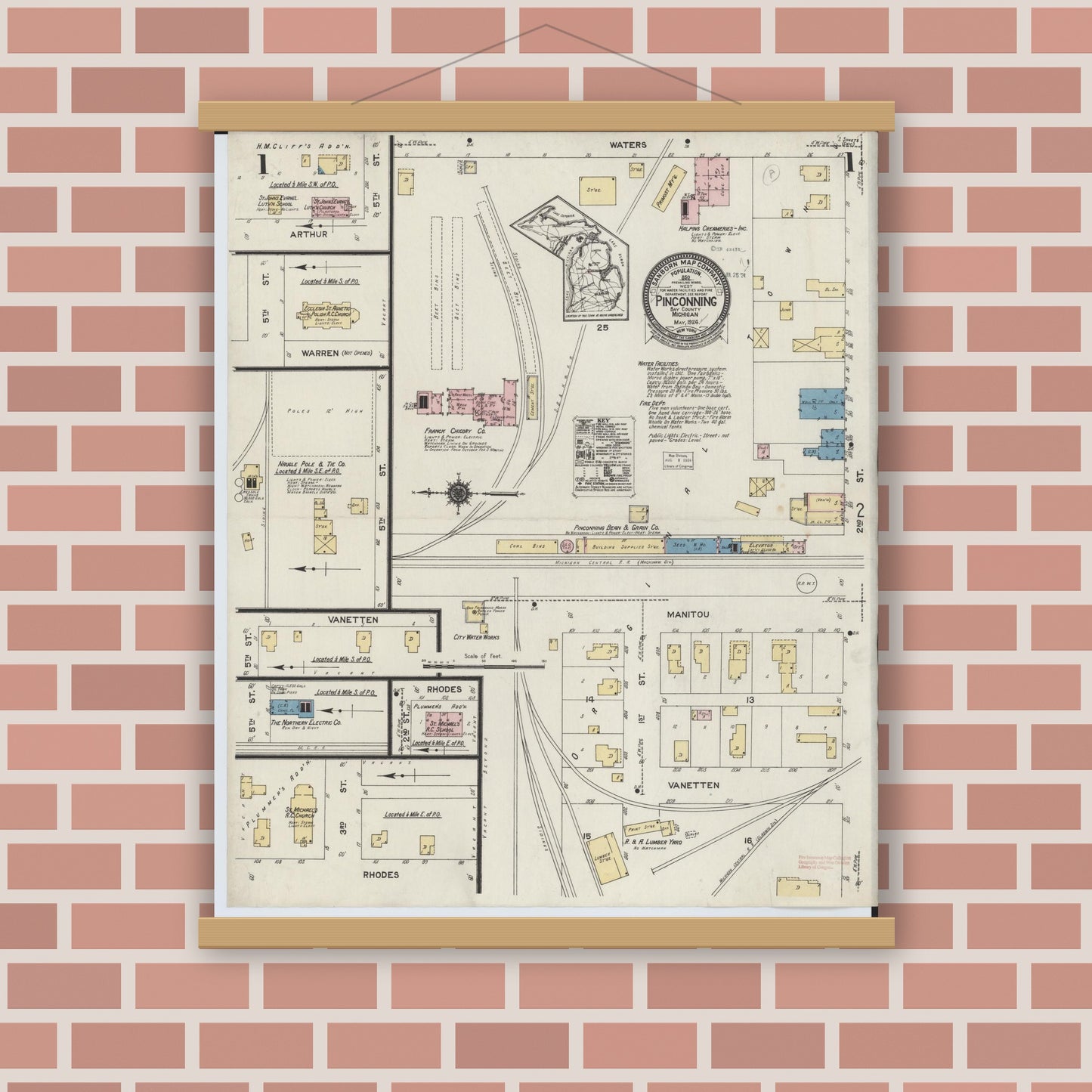 Old map wall art mockup — magnetic wood frame on brick wall — Sanborn Fire Insurance Map from Pinconning, Bay County, Michigan (1924), Sheet #0001