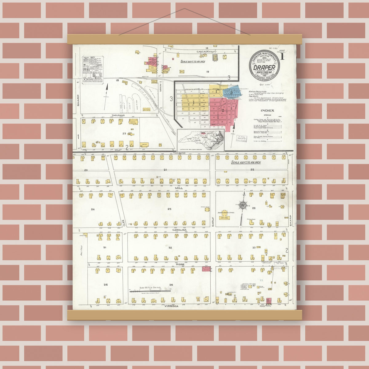 Old map wall art mockup — magnetic wood frame on brick wall — Sanborn Fire Insurance Map from Draper, Rockingham County, North Carolina (1921), Sheet #0001