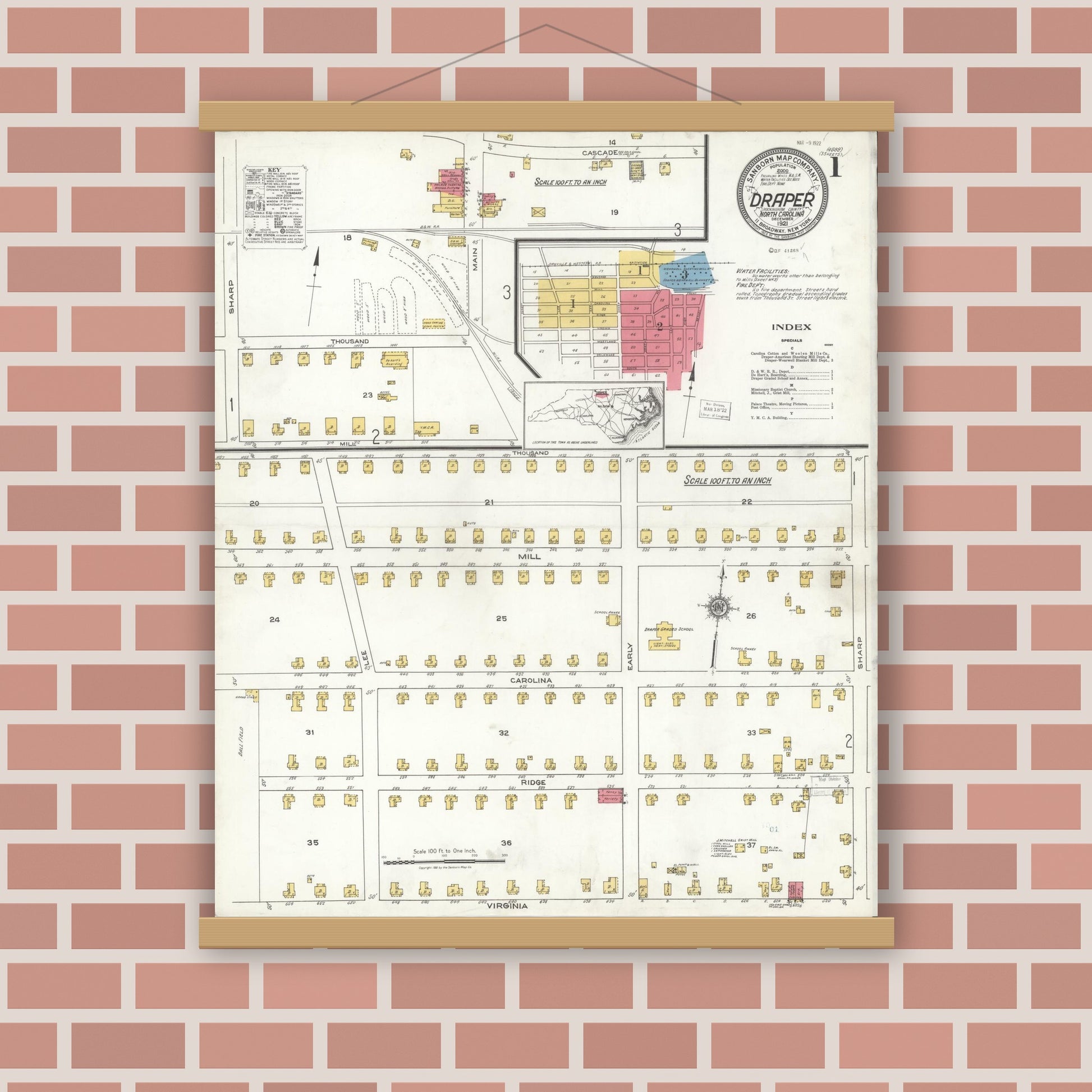 Old map wall art mockup — magnetic wood frame on brick wall — Sanborn Fire Insurance Map from Draper, Rockingham County, North Carolina (1921), Sheet #0001