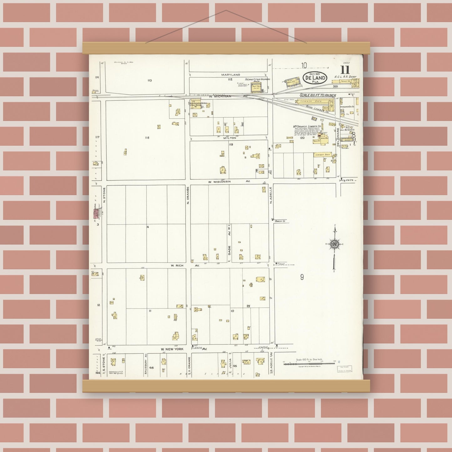 Old map wall art mockup — magnetic wood frame on brick wall — Sanborn Fire Insurance Map from De Land, Volusia County, Florida (1921), Sheet #0011