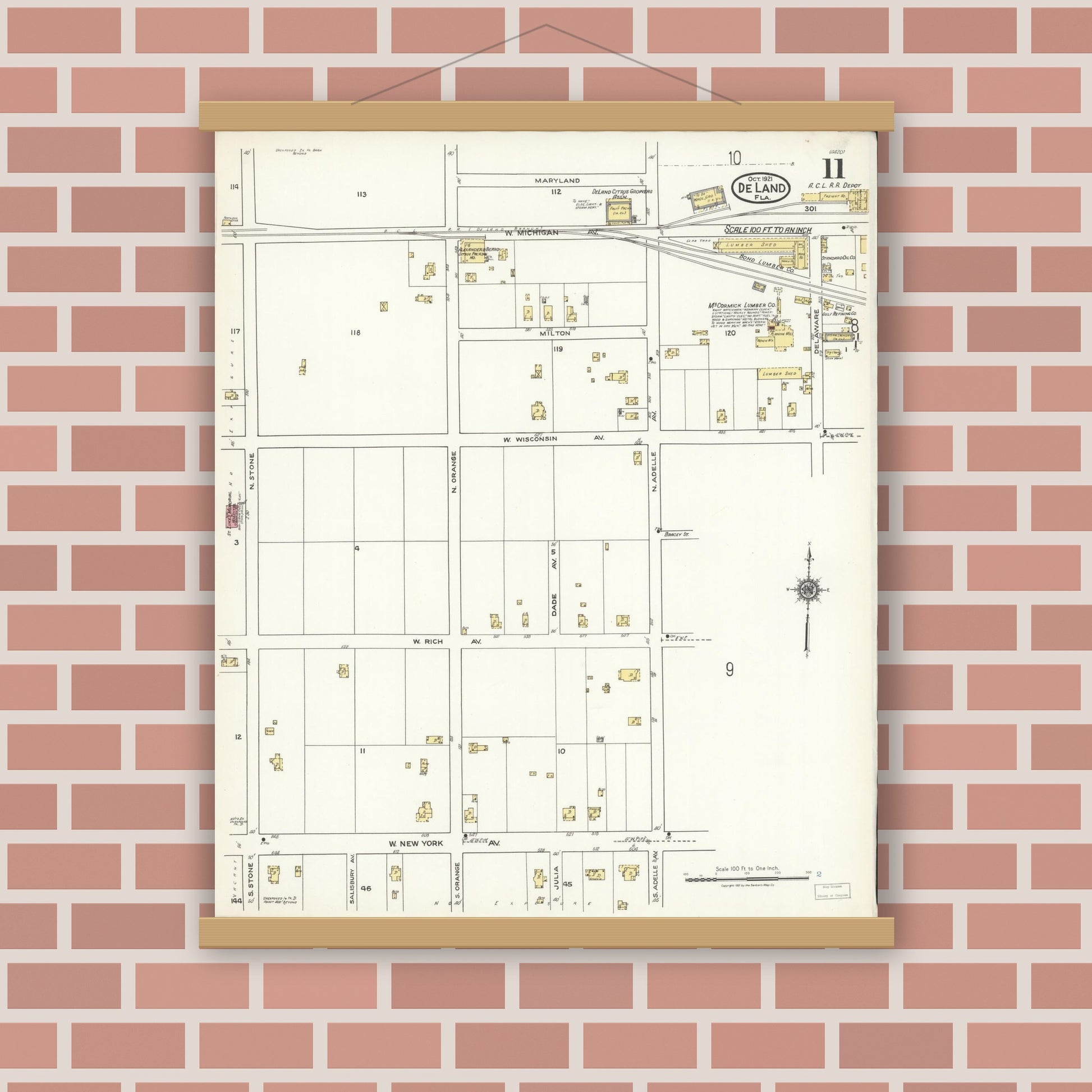 Old map wall art mockup — magnetic wood frame on brick wall — Sanborn Fire Insurance Map from De Land, Volusia County, Florida (1921), Sheet #0011