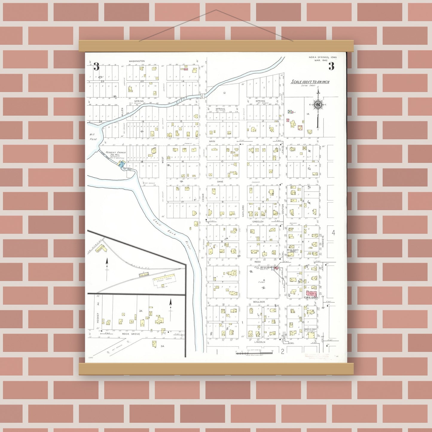 Old map wall art mockup — magnetic wood frame on brick wall — Sanborn Fire Insurance Map from Nora Springs, Floyd County, Iowa (1942), Sheet #0003