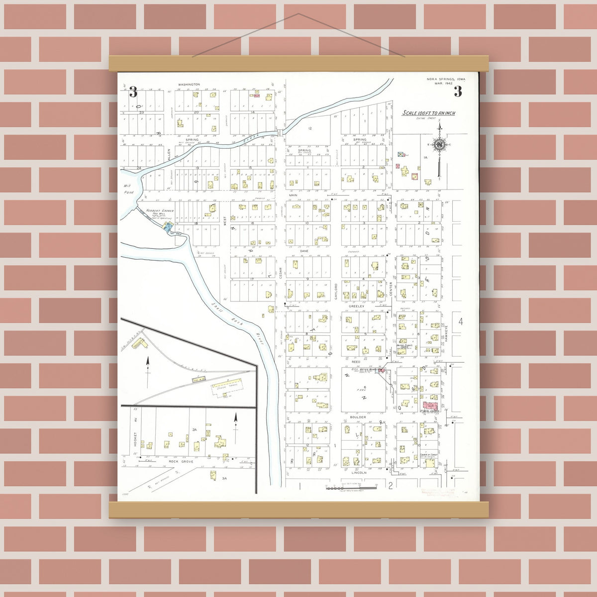 Old map wall art mockup — magnetic wood frame on brick wall — Sanborn Fire Insurance Map from Nora Springs, Floyd County, Iowa (1942), Sheet #0003