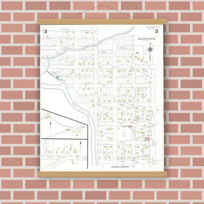 Old map wall art mockup — magnetic wood frame on brick wall — Sanborn Fire Insurance Map from Nora Springs, Floyd County, Iowa (1942), Sheet #0003