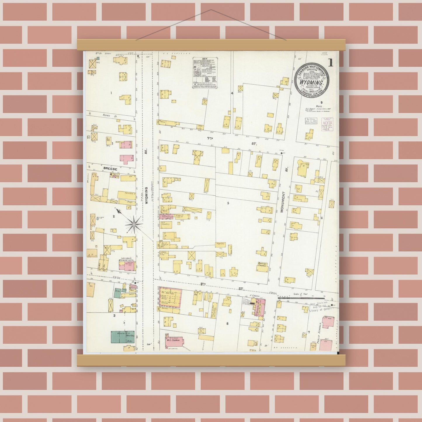 Old map wall art mockup — magnetic wood frame on brick wall — Sanborn Fire Insurance Map from Wyoming, Luzerne County, Pennsylvania (1903), Sheet #0001