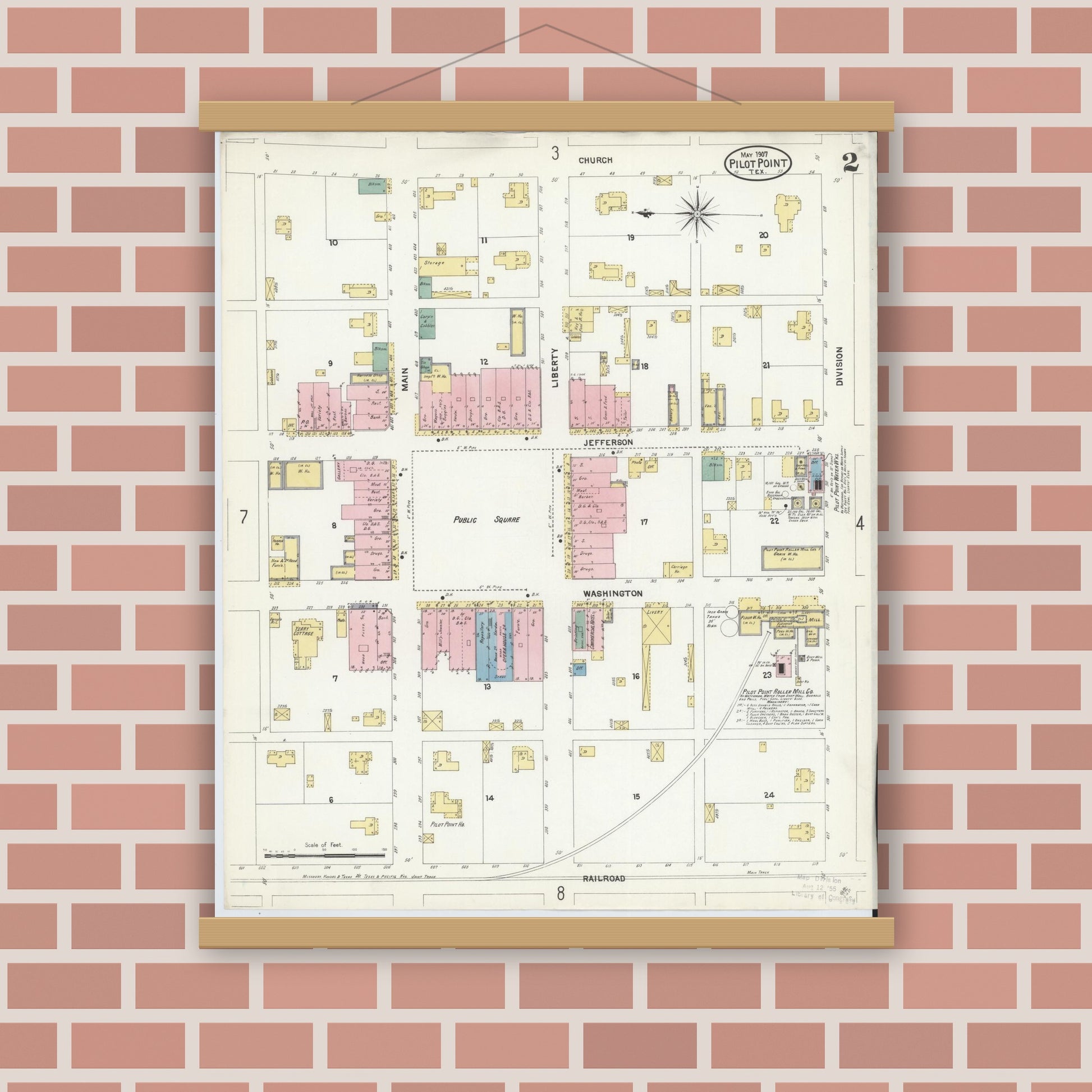 Old map wall art mockup — magnetic wood frame on brick wall — Sanborn Fire Insurance Map from Pilot Point, Denton County, Texas (1907), Sheet #0002