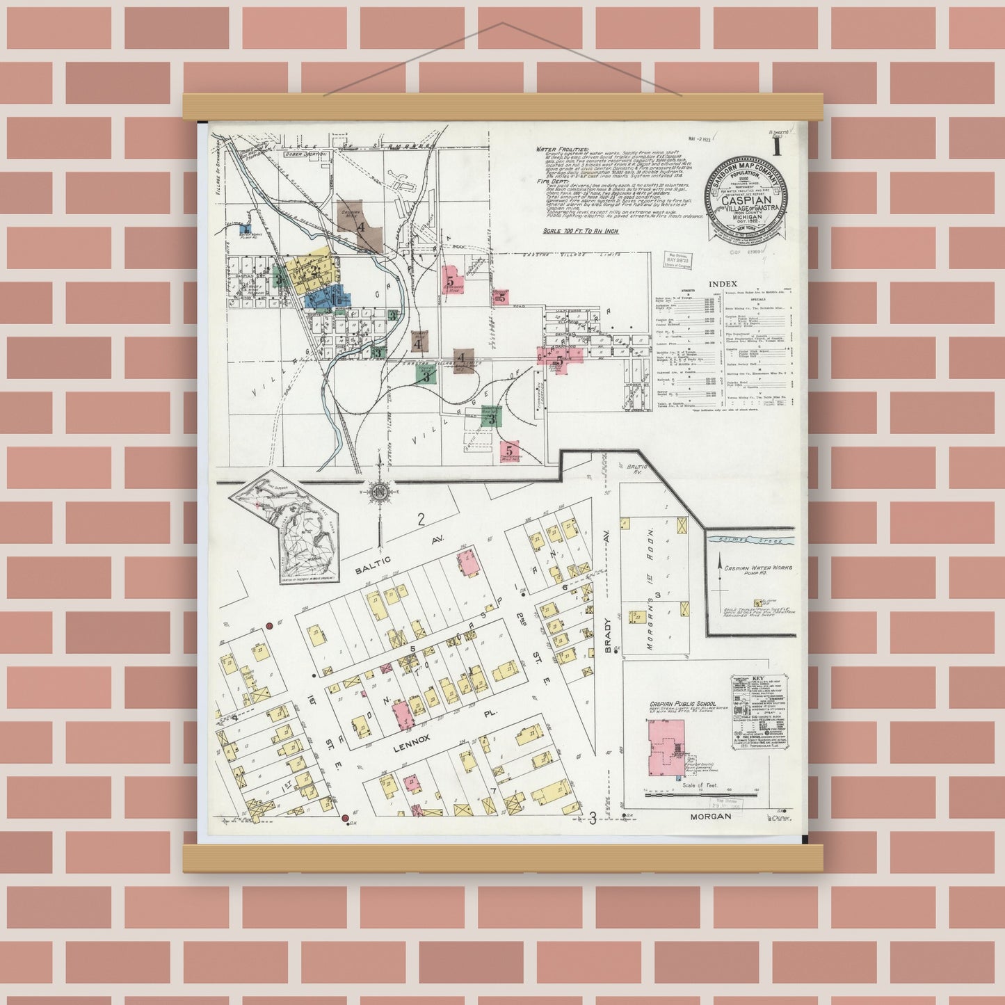 Old map wall art mockup — magnetic wood frame on brick wall — Sanborn Fire Insurance Map from Caspian, Iron County, Michigan (1922), Sheet #0001