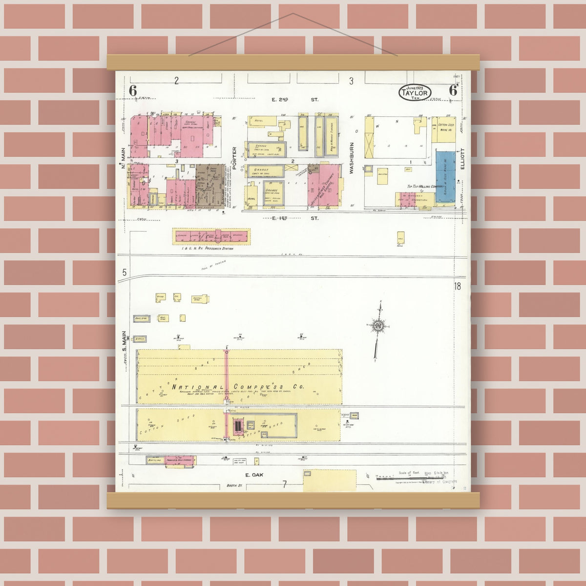 Old map wall art mockup — magnetic wood frame on brick wall — Sanborn Fire Insurance Map from Taylor, Williamson County, Texas (1923), Sheet #0006