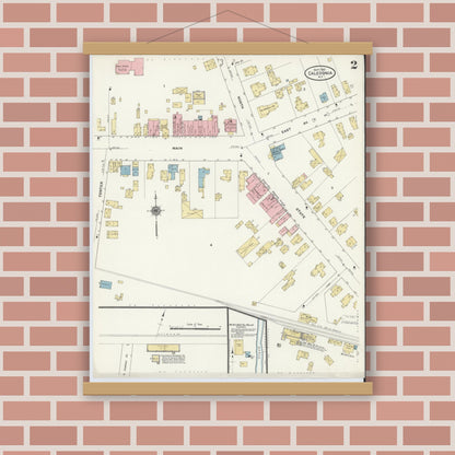 Old map wall art mockup — magnetic wood frame on brick wall — Sanborn Fire Insurance Map from Caledonia, Livingston County, New York (1910), Sheet #0002