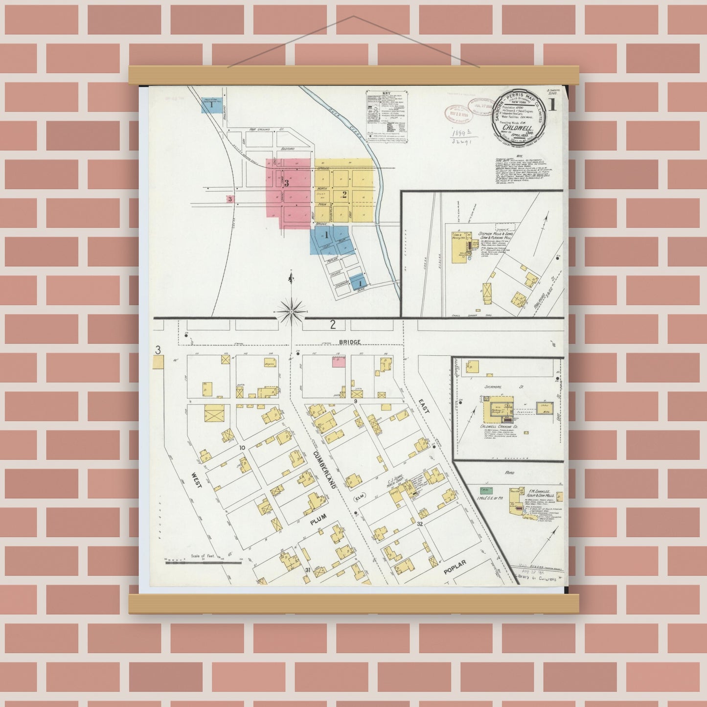 Old map wall art mockup — magnetic wood frame on brick wall — Sanborn Fire Insurance Map from Caldwell, Noble County, Ohio (1899) - Complete Map Set
