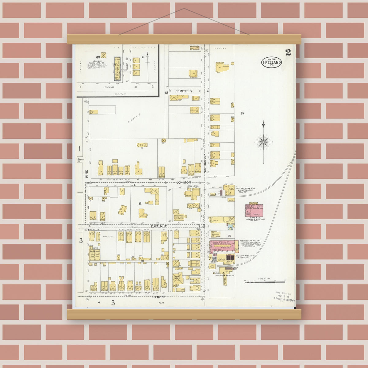 Old map wall art mockup — magnetic wood frame on brick wall — Sanborn Fire Insurance Map from Freeland, Luzerne County, Pennsylvania (1900), Sheet #0002